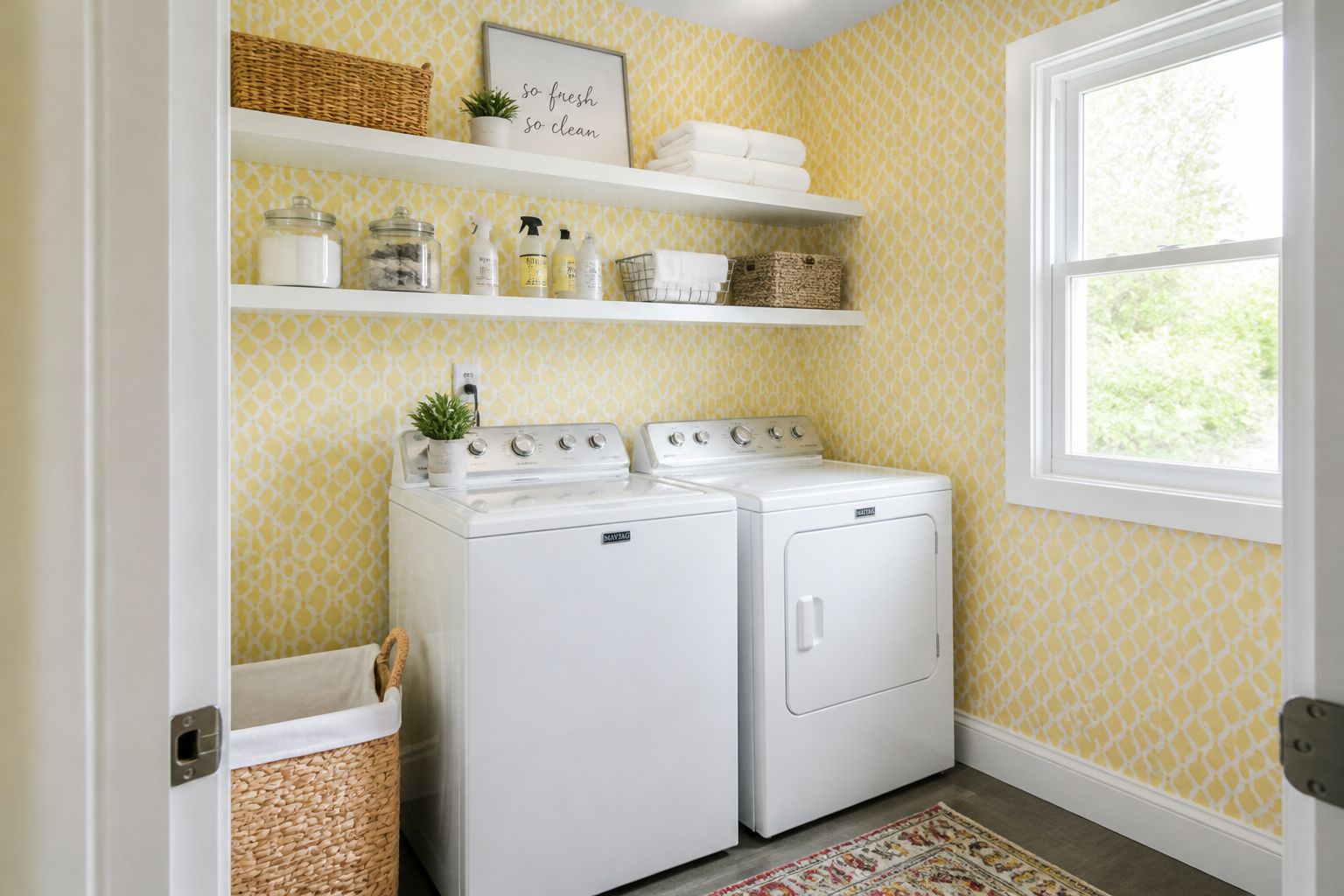 Yellow geometric wallpaper in a laundry room makeover